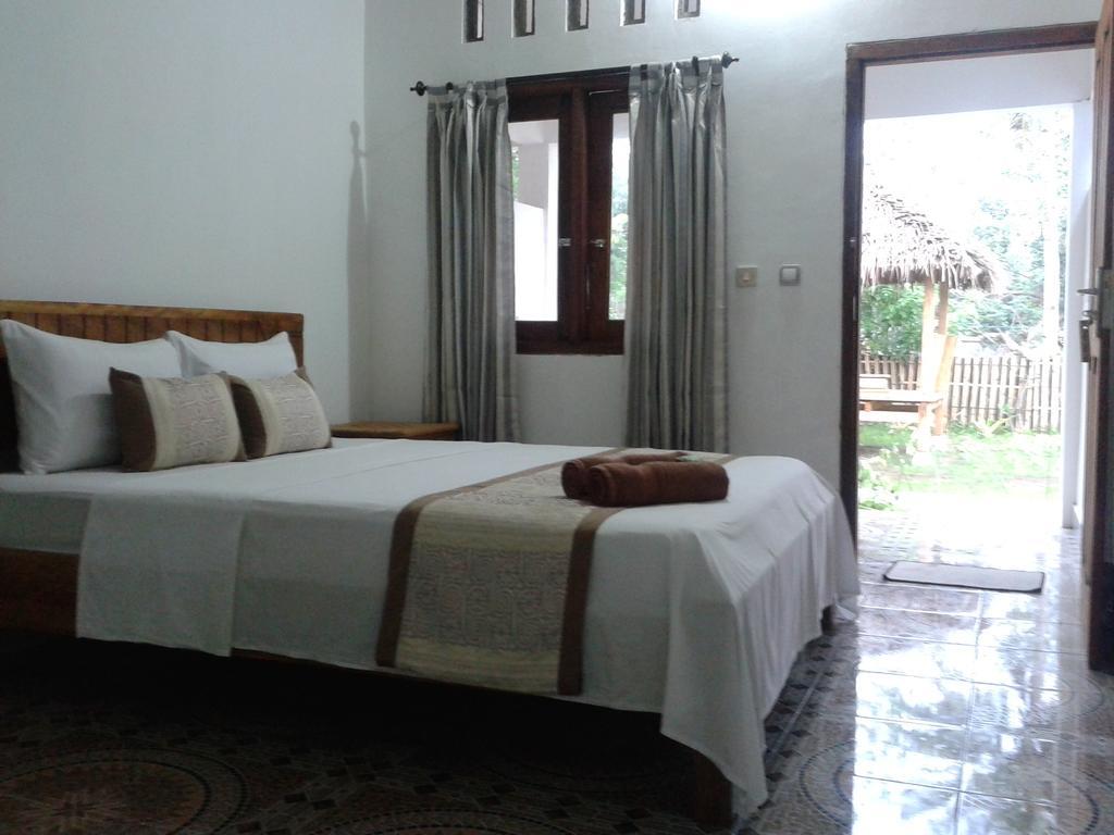גילי מנו Putri Homestay חדר תמונה