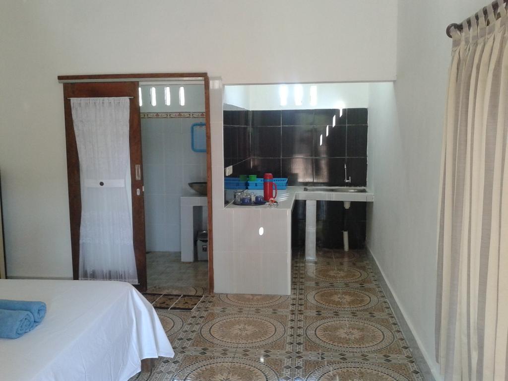 גילי מנו Putri Homestay חדר תמונה