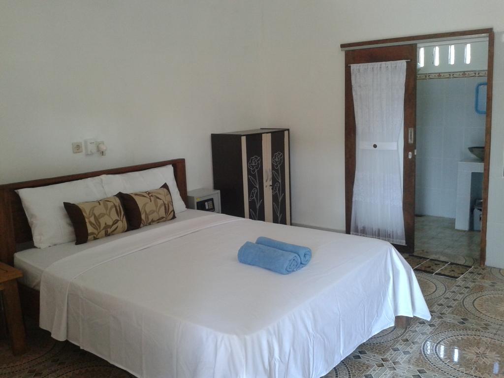 גילי מנו Putri Homestay חדר תמונה
